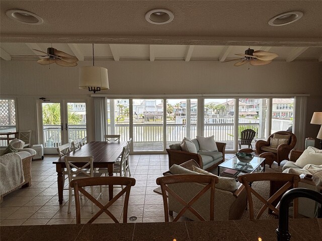 3514 Jolly Roger Cir, Galveston, TX 77554 - sunroom / solarium with beam ceiling and a water view
