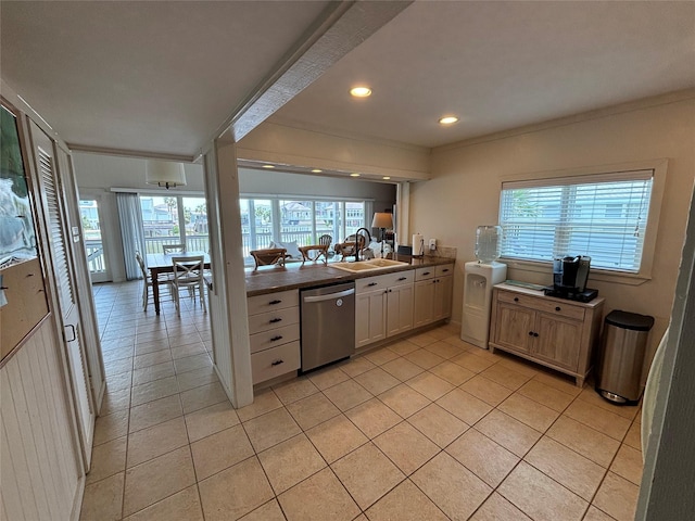 3514 Jolly Roger Cir, Galveston, TX 77554 - kitchen with stainless steel dishwasher, ornamental molding, light tile patterned floors, recessed lighting, and a peninsula