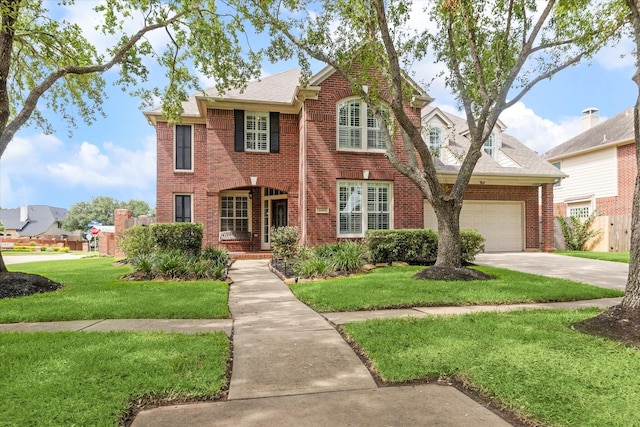 6403 Hidden Crest Way, Sugar Land, TX 77479 - view of front of home featuring brick siding, concrete driveway, an attached garage, and a shingled roof