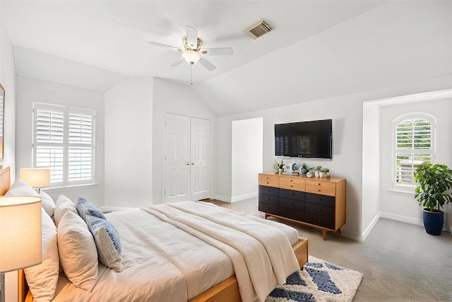 6403 Hidden Crest Way, Sugar Land, TX 77479 - bedroom with vaulted ceiling, ceiling fan, light carpet, and a closet