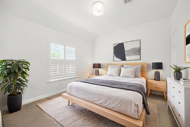 6403 Hidden Crest Way, Sugar Land, TX 77479 - bedroom with lofted ceiling and baseboards