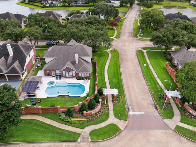 6403 Hidden Crest Way, Sugar Land, TX 77479 - aerial perspective of suburban area featuring a nearby body of water and a pool area