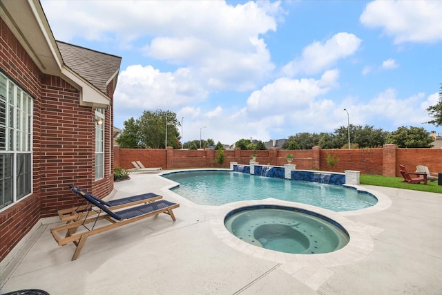 6403 Hidden Crest Way, Sugar Land, TX 77479 - view of swimming pool with an in-ground hot tub, a patio, and a fenced backyard