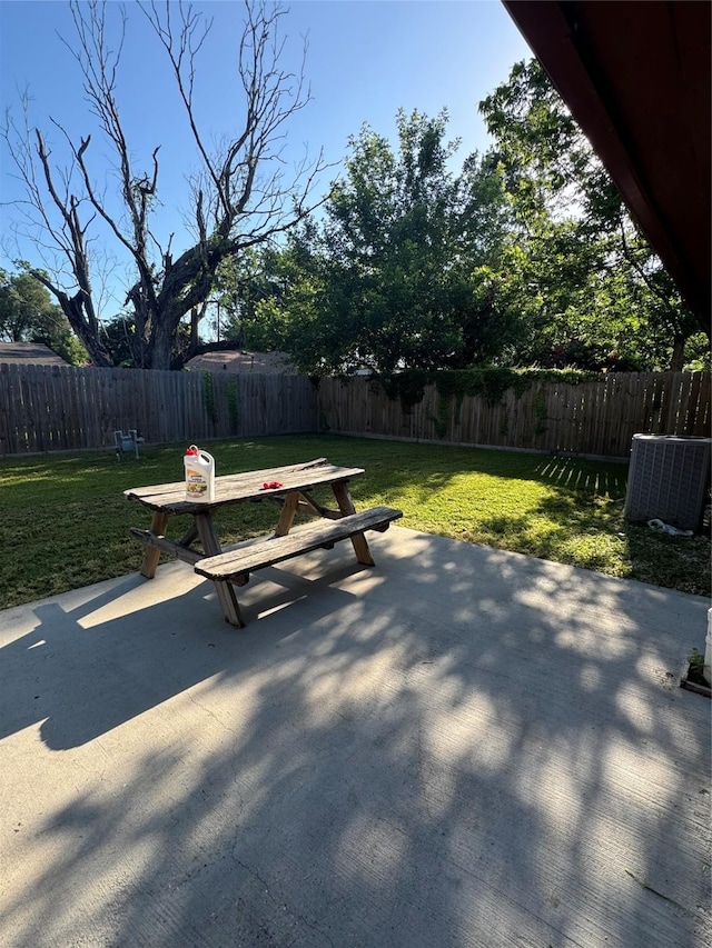 209 W 8th St, Deer Park, TX 77536 - fenced backyard featuring a patio