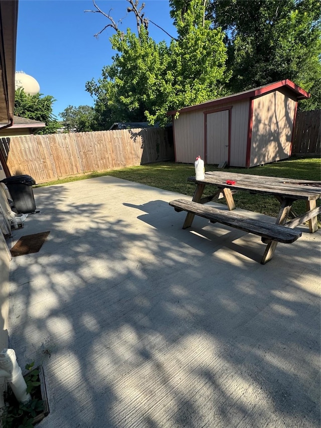 209 W 8th St, Deer Park, TX 77536 - view of patio with a storage shed
