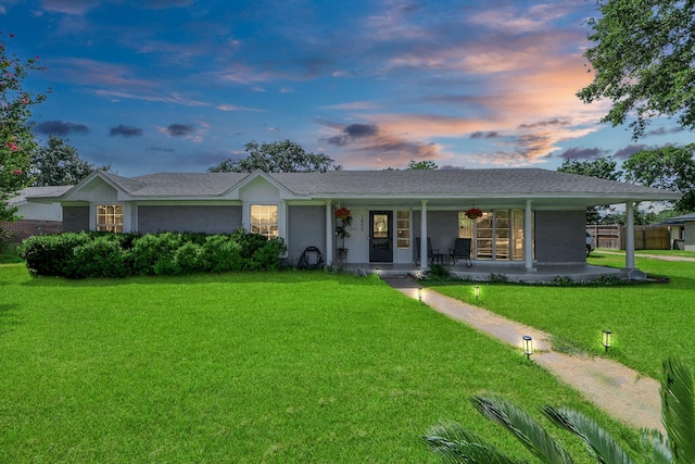 1903 Britton St, Baytown, TX 77520 - ranch-style home featuring covered porch, a front lawn, and a shingled roof