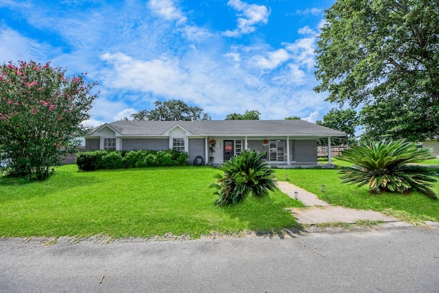 1903 Britton St, Baytown, TX 77520 - single story home featuring a front yard and a porch