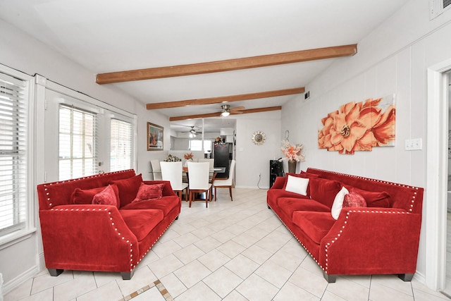 1903 Britton St, Baytown, TX 77520 - living area with a ceiling fan, healthy amount of natural light, light tile patterned flooring, and beam ceiling