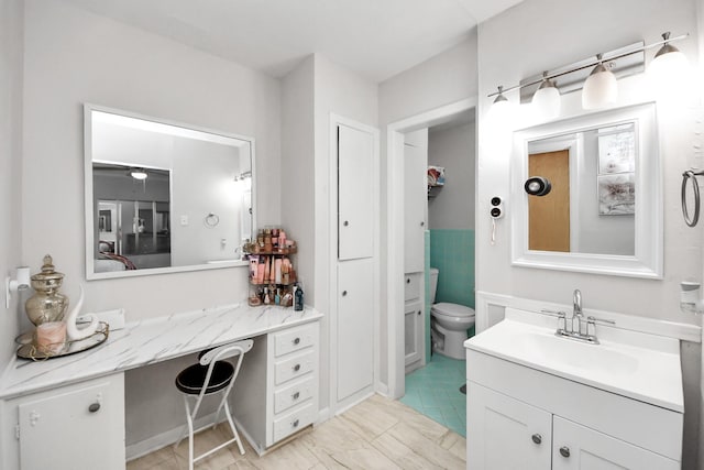 1903 Britton St, Baytown, TX 77520 - full bathroom featuring vanity and toilet