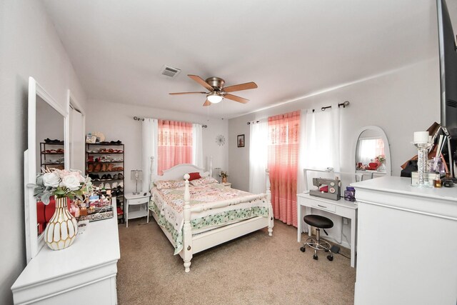 1903 Britton St, Baytown, TX 77520 - bedroom featuring light colored carpet, an office area, and ceiling fan