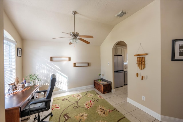 1409 Barras St, Alvin, TX 77511 - office with vaulted ceiling, a ceiling fan, light tile patterned floors, and arched walkways
