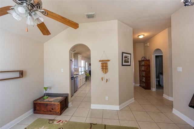 1409 Barras St, Alvin, TX 77511 - corridor featuring arched walkways and light tile patterned floors