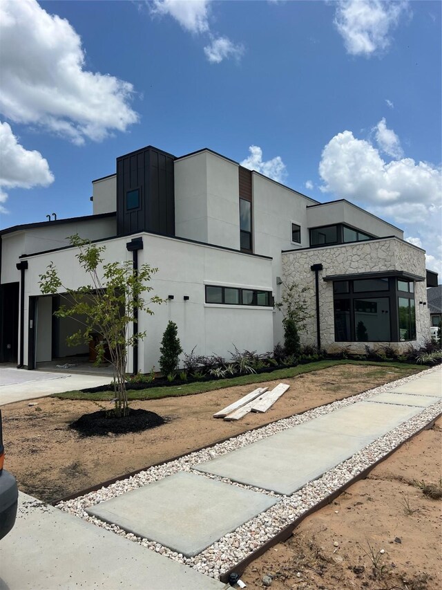 20410 Tealpointe Ridge Ln, Tomball, TX 77377 - view of contemporary home