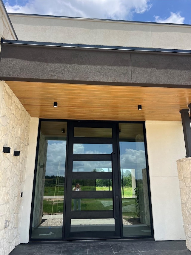 20410 Tealpointe Ridge Ln, Tomball, TX 77377 - property entrance with stucco siding