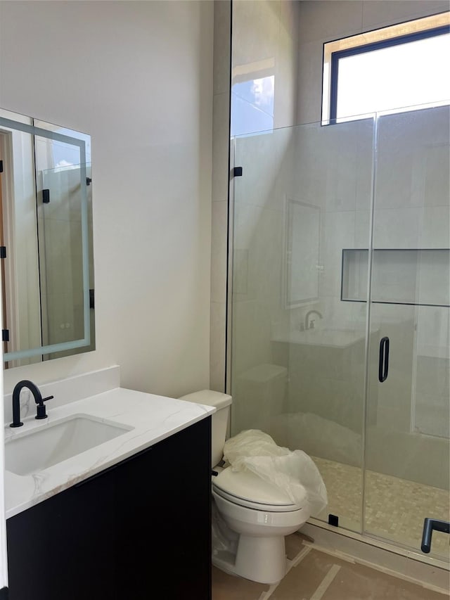 20410 Tealpointe Ridge Ln, Tomball, TX 77377 - full bathroom with vanity and a shower stall
