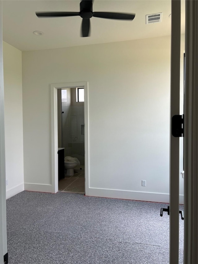 20410 Tealpointe Ridge Ln, Tomball, TX 77377 - unfurnished bedroom with carpet flooring, connected bathroom, and ceiling fan