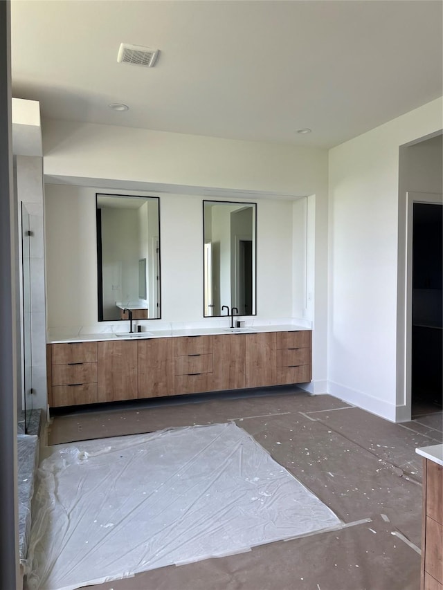 20410 Tealpointe Ridge Ln, Tomball, TX 77377 - full bath with double vanity and concrete flooring