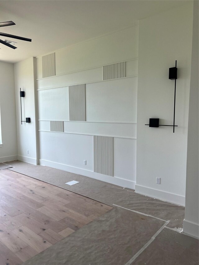 20410 Tealpointe Ridge Ln, Tomball, TX 77377 - empty room with ceiling fan and wood finished floors