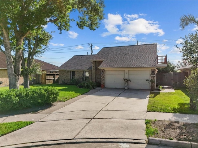 2004 Tuscarora Ct, League City, TX 77573 - view of front facade with a garage, concrete driveway, roof with shingles, and brick siding