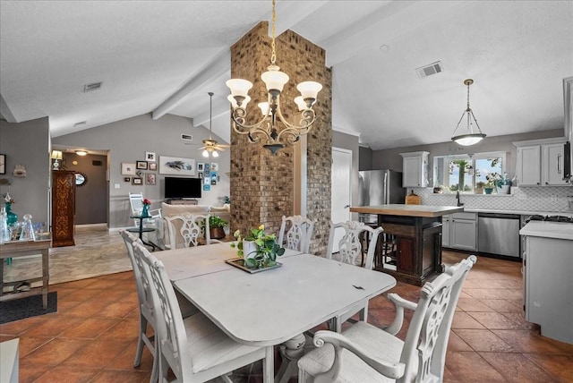 2004 Tuscarora Ct, League City, TX 77573 - dining space with a ceiling fan, a chandelier, and dark tile patterned flooring