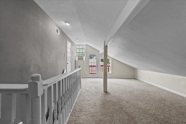 2004 Tuscarora Ct, League City, TX 77573 - bonus room with vaulted ceiling, a textured ceiling, carpet floors, cooling unit, and a textured wall