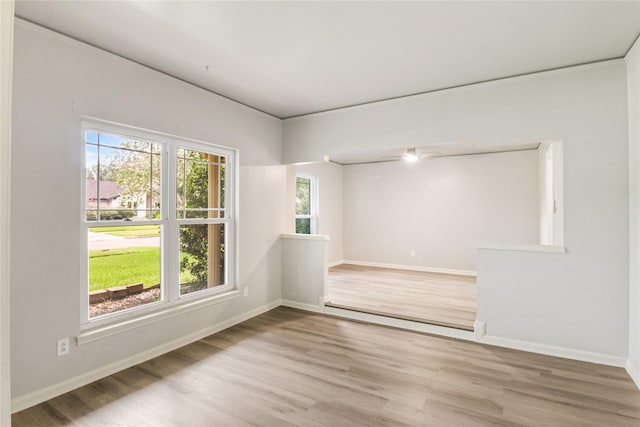 8302 Burning Hills Dr, Houston, TX 77071 - empty room with wood finished floors and baseboards