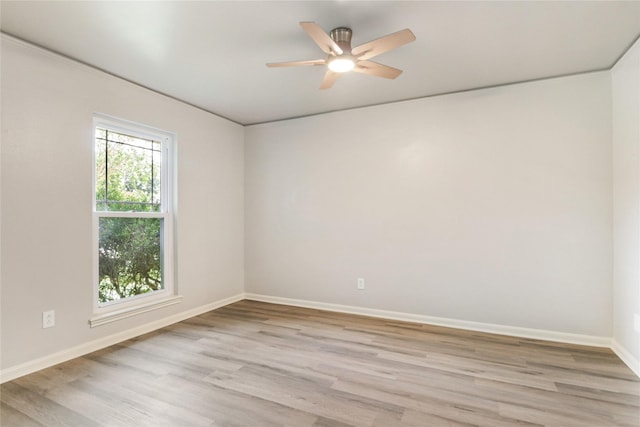 8302 Burning Hills Dr, Houston, TX 77071 - spare room with light wood-style floors and a ceiling fan