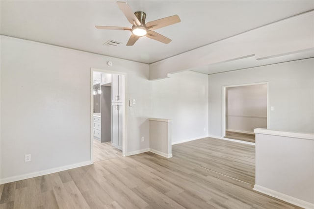8302 Burning Hills Dr, Houston, TX 77071 - spare room with a ceiling fan and light wood-type flooring