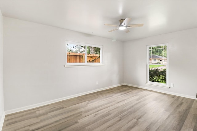 8302 Burning Hills Dr, Houston, TX 77071 - empty room with a ceiling fan and wood finished floors