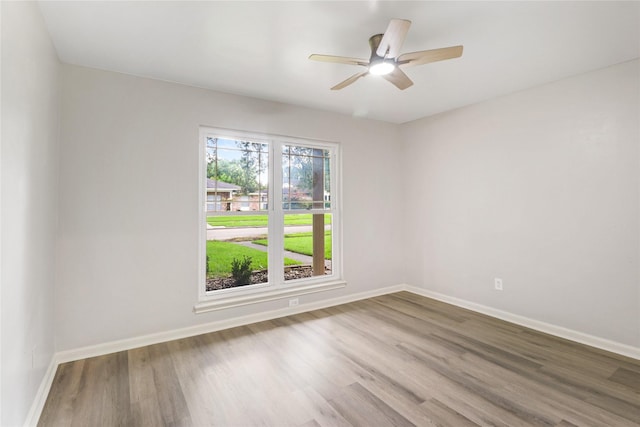 8302 Burning Hills Dr, Houston, TX 77071 - unfurnished room featuring wood finished floors and a ceiling fan