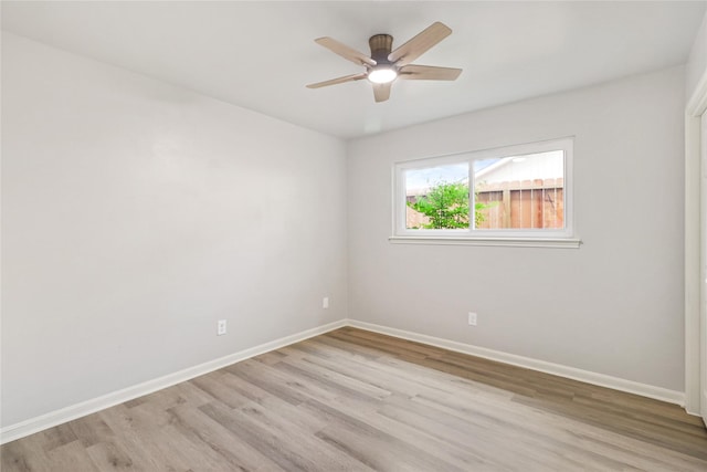 8302 Burning Hills Dr, Houston, TX 77071 - unfurnished room with light wood-type flooring and ceiling fan