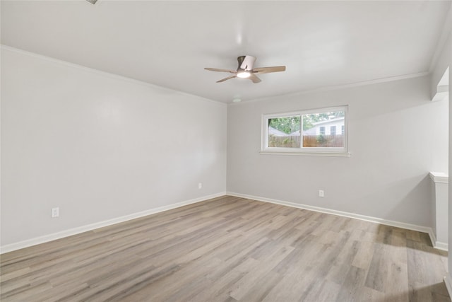 8302 Burning Hills Dr, Houston, TX 77071 - empty room featuring a ceiling fan, light wood-style floors, and crown molding