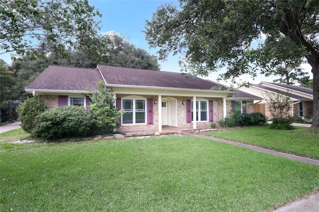 8302 Burning Hills Dr, Houston, TX 77071 - ranch-style home with a front lawn, brick siding, a shingled roof, and covered porch