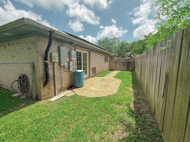 309 Baycrest Dr, League City, TX 77573 - fenced backyard with a patio