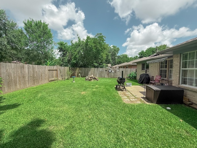 309 Baycrest Dr, League City, TX 77573 - fenced backyard featuring an outdoor fire pit