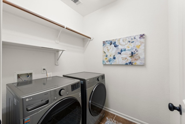 14 Painted Post Pl, The Woodlands, TX 77389 - laundry room with washer and dryer and baseboards
