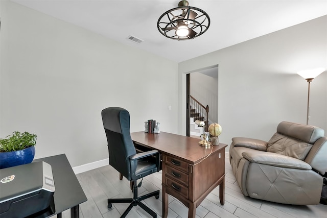2411 Sunset Mist Ln, Conroe, TX 77304 - office area with baseboards and light wood-type flooring