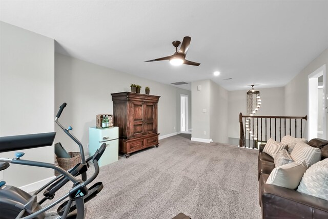 2411 Sunset Mist Ln, Conroe, TX 77304 - exercise area with a ceiling fan and light colored carpet