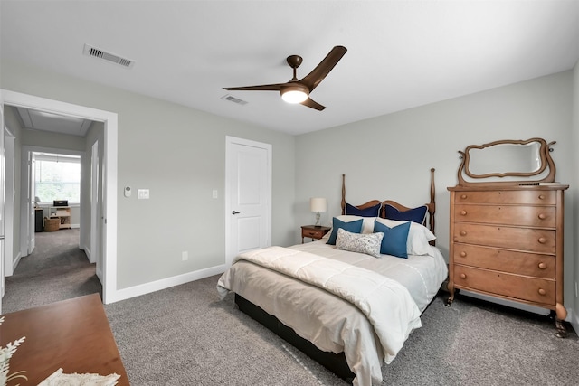 2411 Sunset Mist Ln, Conroe, TX 77304 - carpeted bedroom with attic access and a ceiling fan