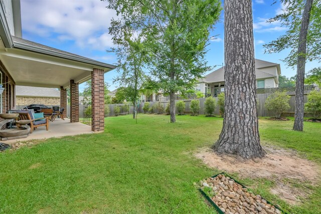 2411 Sunset Mist Ln, Conroe, TX 77304 - view of fenced backyard