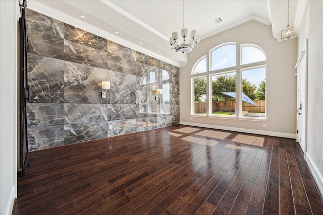 10306 Grape Creek Grove Ln, Cypress, TX 77433 - unfurnished room with a chandelier, wood finished floors, crown molding, and vaulted ceiling