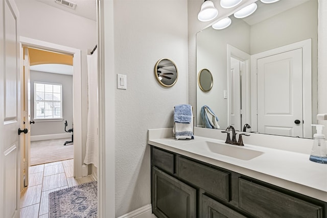 2424 Prairie Mist Ln, Friendswood, TX 77546 - bathroom with vanity and a shower with shower curtain