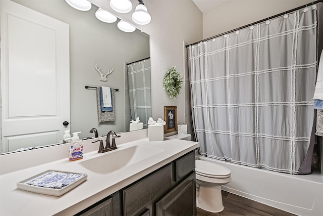 2424 Prairie Mist Ln, Friendswood, TX 77546 - bathroom featuring vanity, shower / bath combo with shower curtain, and wood finished floors
