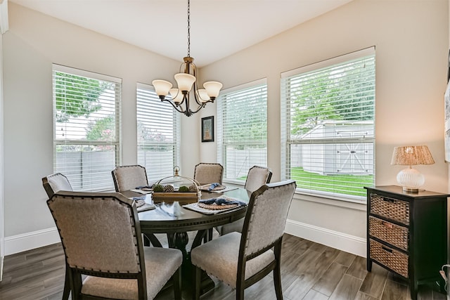 2424 Prairie Mist Ln, Friendswood, TX 77546 - dining room with a chandelier, plenty of natural light, and dark wood-type flooring