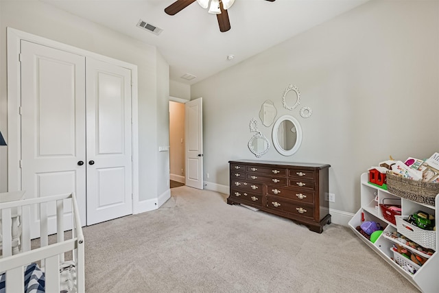 2424 Prairie Mist Ln, Friendswood, TX 77546 - carpeted bedroom with baseboards and a ceiling fan