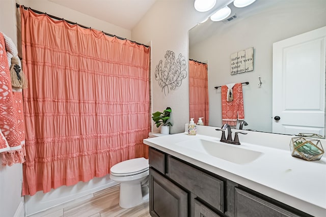 2424 Prairie Mist Ln, Friendswood, TX 77546 - full bathroom with vanity, wood finished floors, and shower / tub combo with curtain