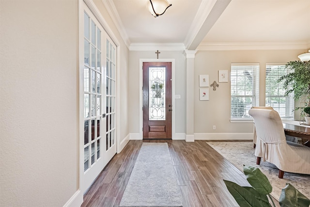 2424 Prairie Mist Ln, Friendswood, TX 77546 - entrance foyer featuring crown molding and wood finished floors