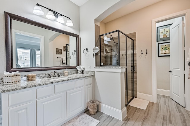 2424 Prairie Mist Ln, Friendswood, TX 77546 - bathroom featuring vanity and a shower stall