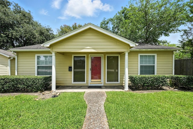 6305 S Rice Ave, Bellaire, TX 77401 - bungalow-style house featuring roof with shingles