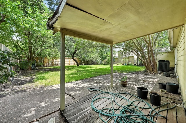 6305 S Rice Ave, Bellaire, TX 77401 - fenced backyard featuring a patio area